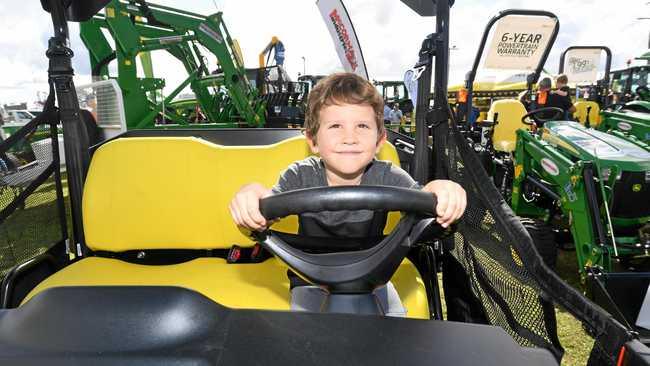 DRIVING FORCE: Jax Riley in Machinery Allley was one of many patrons driving the Gympie Show to success yesterday. Picture: Troy Jegers