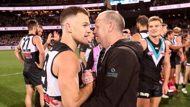 Power coach Ken Hinkley congratulates Showdown Medallist Robbie Gray on his match-winning performance. Picture: James Elsby/AFL Media/Getty Images