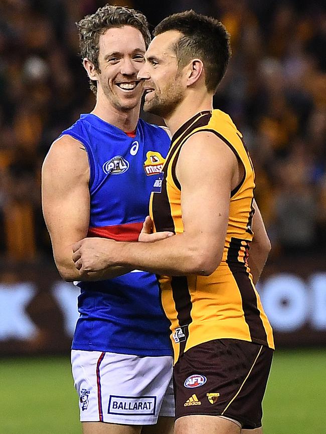 The footy world thought Hodge was retiring when he and Bob Murphy played in the final round of 2017. Pic: AAP