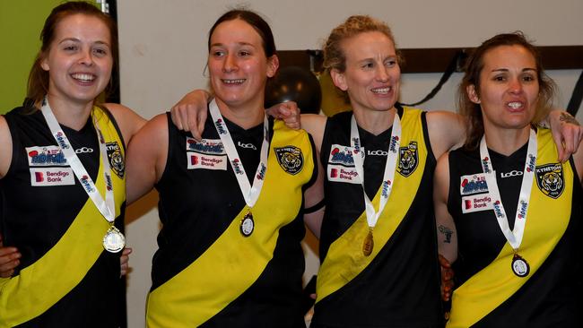 Kyneton women’s players celebrate after winning the 2022 RDFNL premiership. Picture: Josh Chadwick