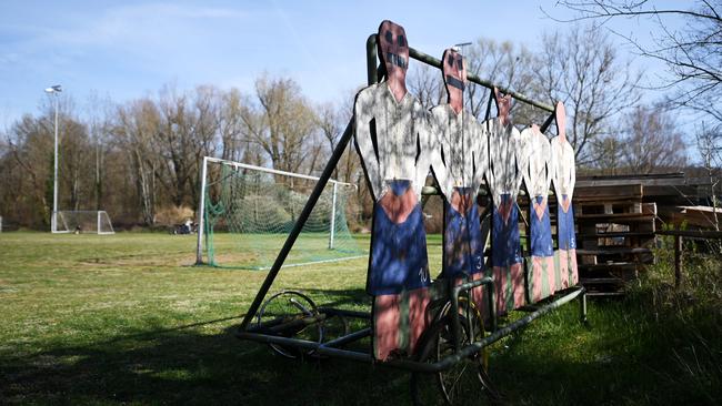 An old fashioned defensive training wall at an empty football ground in Karlsruhe, Germany.