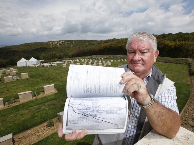 Memories ... Arthur Orchard 66 of Hobart, holds a book containing a drawing from his father Bert Orchard, who sketched the area around his gun position, including Shell Green Cemetery. His father was saved by or saved Field Marshal Thomas Blamey. Picture: David Caird