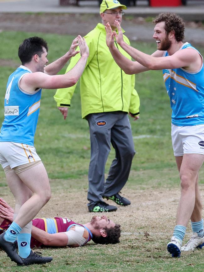 Nicholas Woodland and Mitch King celebrate a goal for Monash Blues. Picture: George Salpigtidis