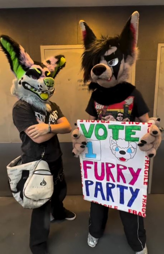Mr Gunn was holding this sign on election day when he was set upon. Picture: Instagram