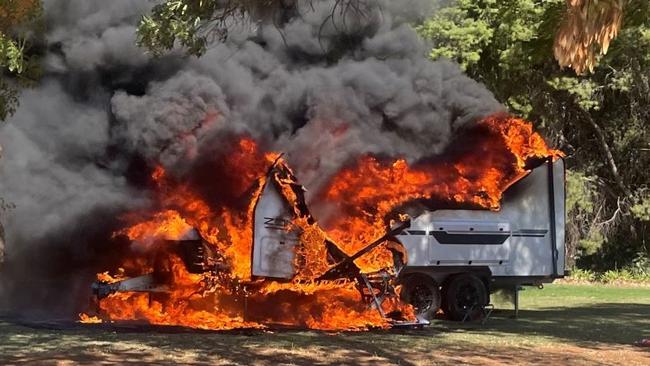A caravan on fire at Auburn Community Caravan Park. Picture: CFS