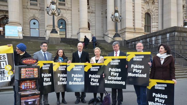 Mayors from across Melbourne campaigned against poker machines outside State Parliament.