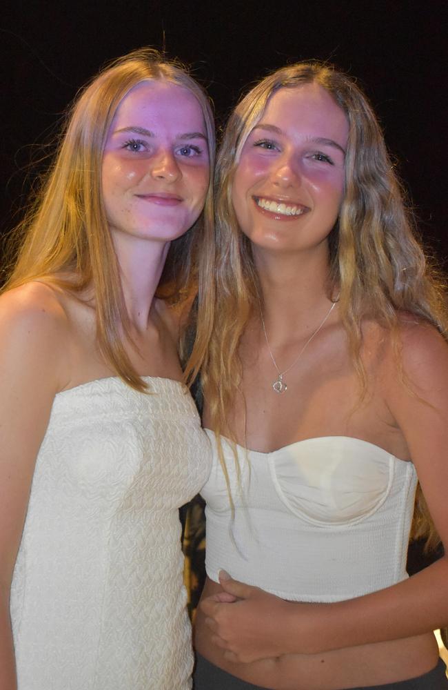 Milla and Georgia (surnames not given) celebrating New Year's Eve 2022 at Mooloolaba. Photo: Elizabeth Neil