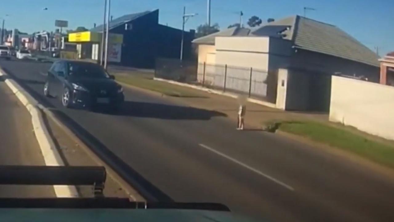 The little boy managed to escape his Adelaide home to run onto the road. Picture: Nine News