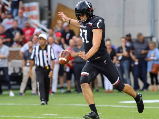 Australian punter James Smith in action for UC