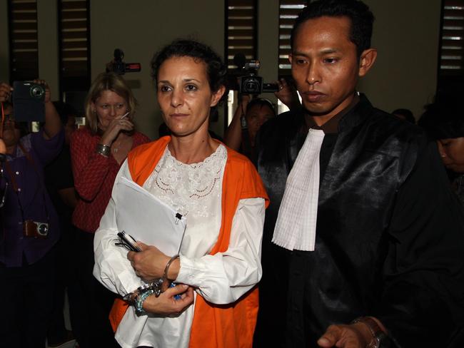 Sara Connor is escorted back to the cell after a day’s hearing at Denpasar District Court into allegations that Connor and her boyfriend David Taylor accused murdered policeman Wayan Sudarsa on Kuta Beach. Picture: Lukman S Bintoro.