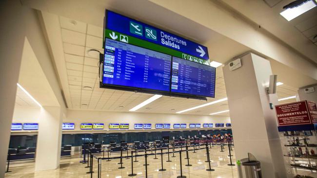 Empty counters of different commercial airlines are seen at the Merida Manuel Crecencio Rejan airport after being closed before the arrival of Hurricane Milton. Picture: AFP