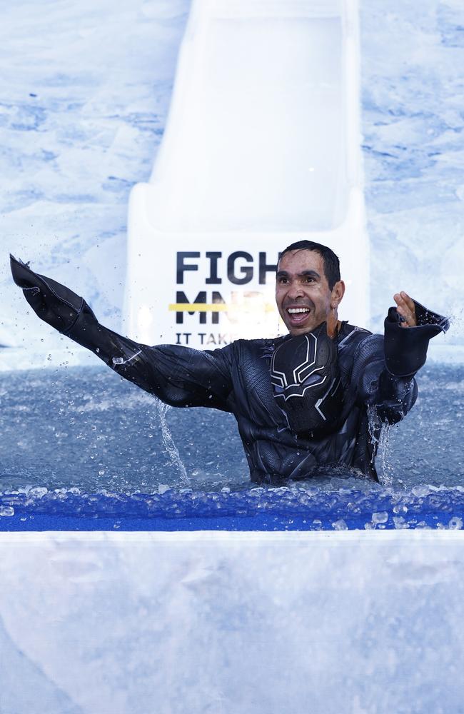 Eddie Betts gestures after going down the slide for Big Freeze 8. Picture: Getty Images