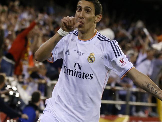 (Files) In this file picture taken on April 16, 2014, Real Madrid's Argentinian midfielder Angel di Maria celebrates after scoring during the Spanish Copa del Rey (King's Cup) final football match against FC Barcelona at the Mestalla stadium in Valencia. Manchester United have agreed a British record transfer fee of £59.7 million ($98 million, 75 million euros) to sign Argentina midfielder Angel Di Maria from Real Madrid according to British media reports on Monday, August 25, 2014. Several media outlets, including the BBC, reported that United have finally sealed a deal for Di Maria after several days of negotiations with the Spanish club. AFP PHOTO/ CESAR MANSO