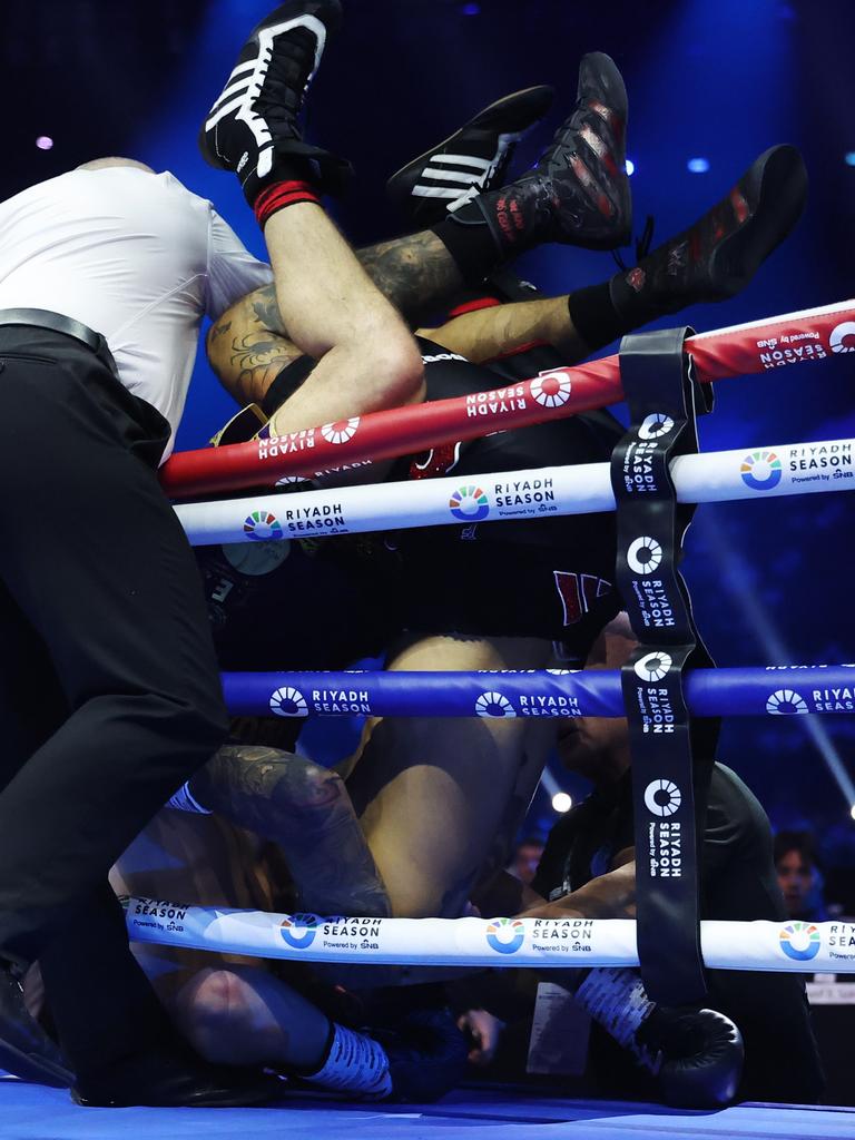 Over they go. (Photo by Richard Pelham/Getty Images)