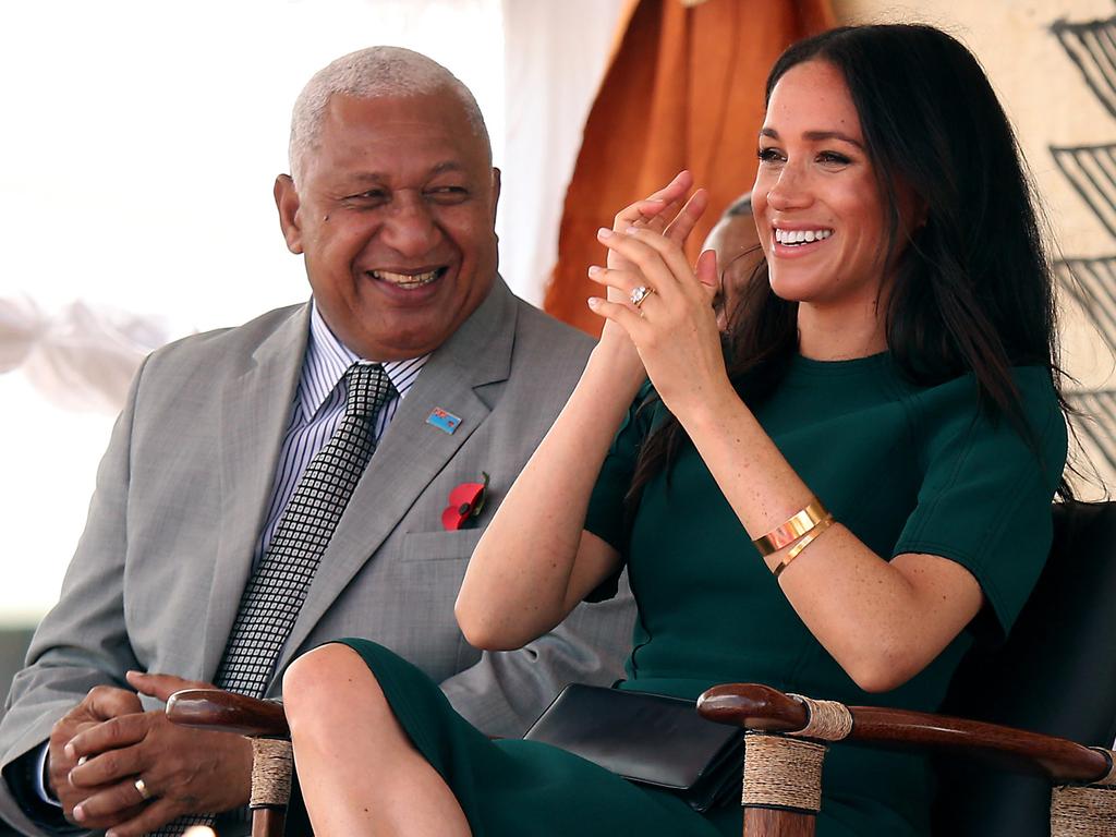 The Duke and Duchess of Sussex Prince Harry and Meghan take part in a traditional fijian ceremony at Nadi Airport in Fiji to . Picture: Nathan Edwards