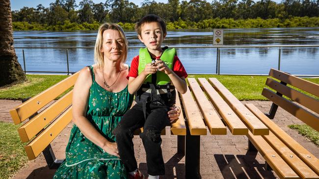 Sandra Krawcxuk with son Charlie, 5, taking a look at the flooding at the Renmark waterfront. Picture: Tom Huntley