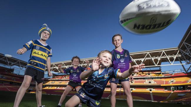 Queensland NRL fans Oliver Godwin 9, Sebi Hoyland-Gray 8, Richie Mcilwain 7, and Tommy Mcilwain 10, are excited for the chance for Suncorp to host this year’s NRL grand final. Picture: Lachie Millard