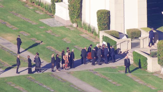 Jennifer Aniston, Matt LeBlanc, Courtney Cox and David Schwimmer hug as they say goodbye to their friend Matthew Perry. Picture: Shutterstock / SplashNews.com