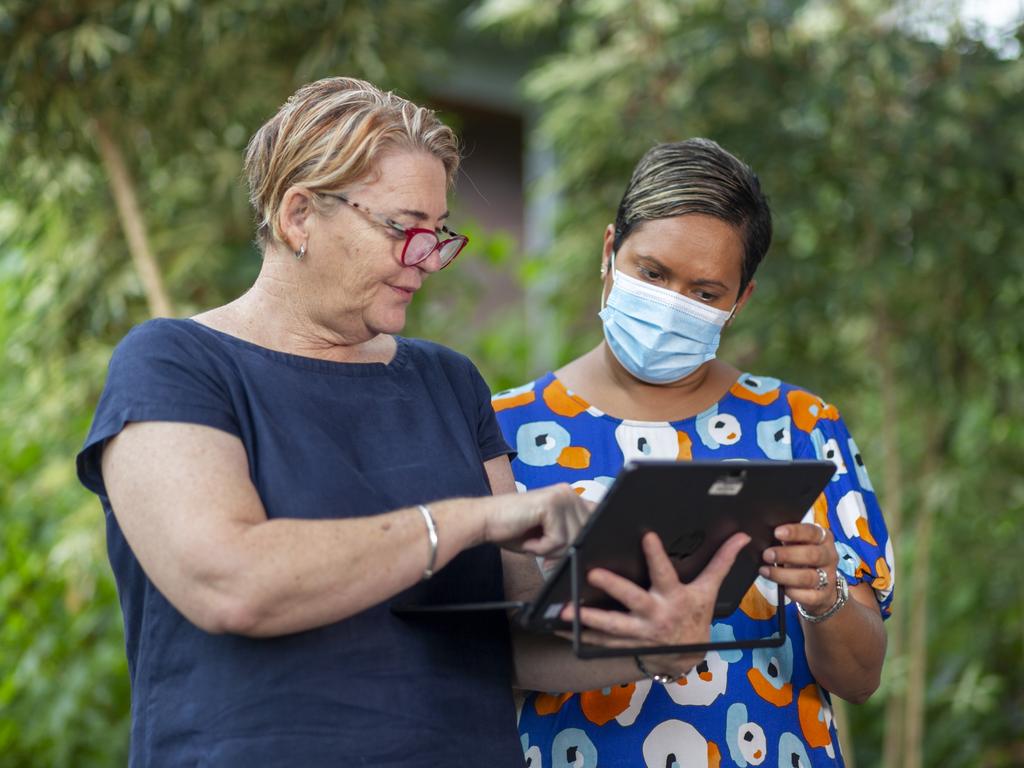 Parks and Wildlife executive director Sally Egan shows Parks and Wildlife Minister Selena Uibo how easy it is to book on through the new portal which go live on Tuesday at 9am. Picture: Floss Adams.