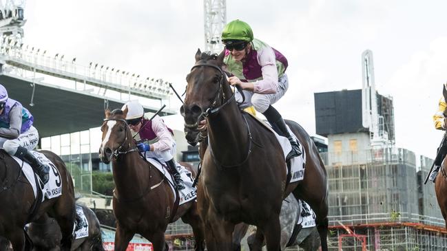 MELBOURNE, AUSTRALIA - SEPTEMBER 07: Ethan Brown riding Mornington Glory defeats Hayasugi and Lady of Camelot in Race 9, the Charter Keck Cramer Moir Stakes - Betting Odds during Melbourne Racing at Moonee Valley Racecourse on September 07, 2024 in Melbourne, Australia. (Photo by Vince Caligiuri/Getty Images)