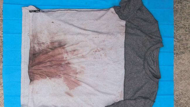 The bloodstained T-shirt left behind by the attacker.