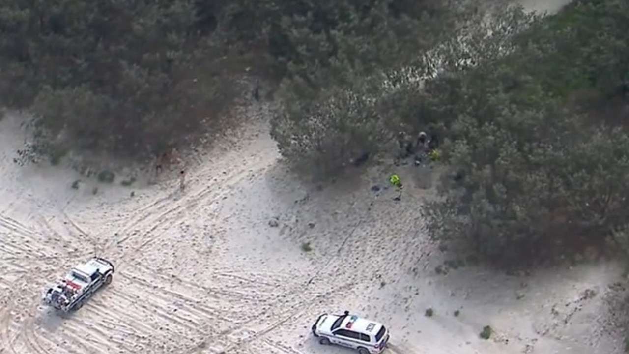 Mr Taylor lay on the sand without a pulse for 45 minutes while the group took turns performing CPR. Picture: Nine News