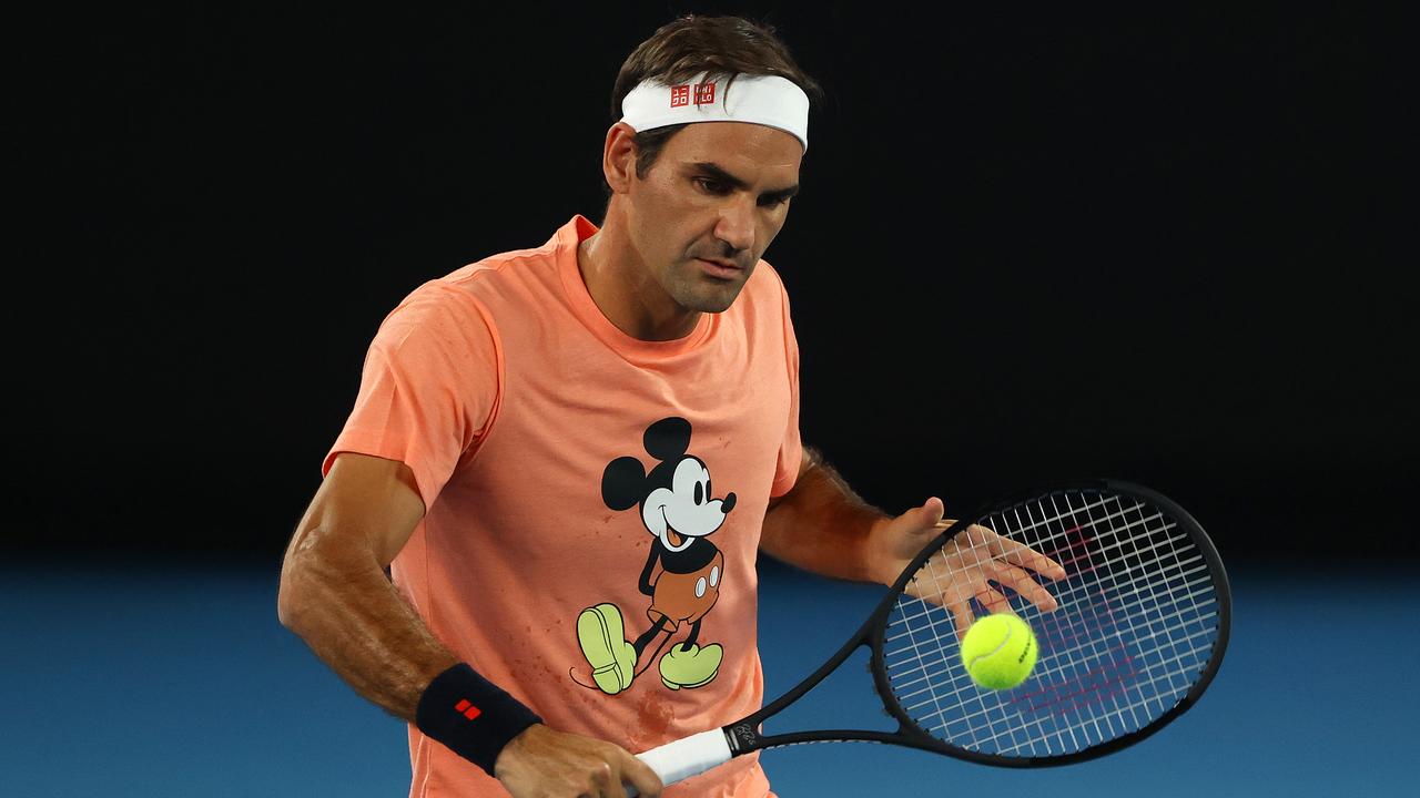 Roger Federer returns for his 21st consecutive Australian Open. (Photo by Clive Brunskill/Getty Images)