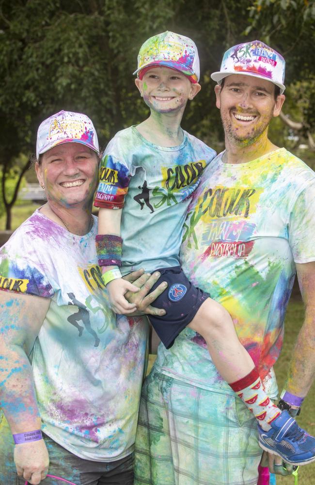 Chris, Dean and Marg Froyland from West Mackay at the Mackay Colour Run 2021. Picture: Michaela Harlow