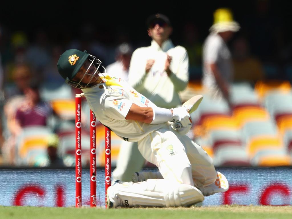 Warner has been forced to take his time early on Day 2 at the Gabba. Picture: Chris Hyde/Getty Images