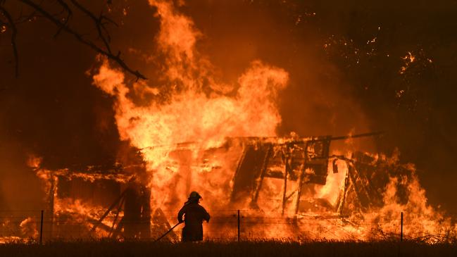 The inquiry into the Black Summer bushfires has heard global warming-related extreme weather events may put Australian emergency services in the ‘dire position’ of having to choose which incident they respond to. Picture: AAP