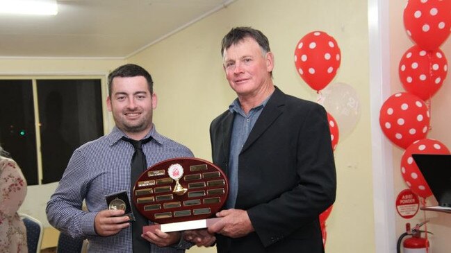 Greg Peltz presenting his son Brandon with the Best and Fairest Award for 2021. Picture: contributed