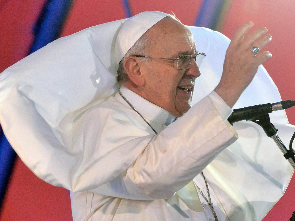 The wind blows Pope Francis's mantle as he speaks at Copacabana beach in Rio de Janeiro, Brazil during the World Youth Day on July 25, 2013. Picture: AFP