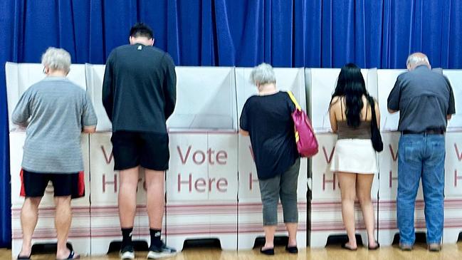 Pre-Polls - Generic polling booth picture. People voting (Southport Community Centre).NO BYLINE