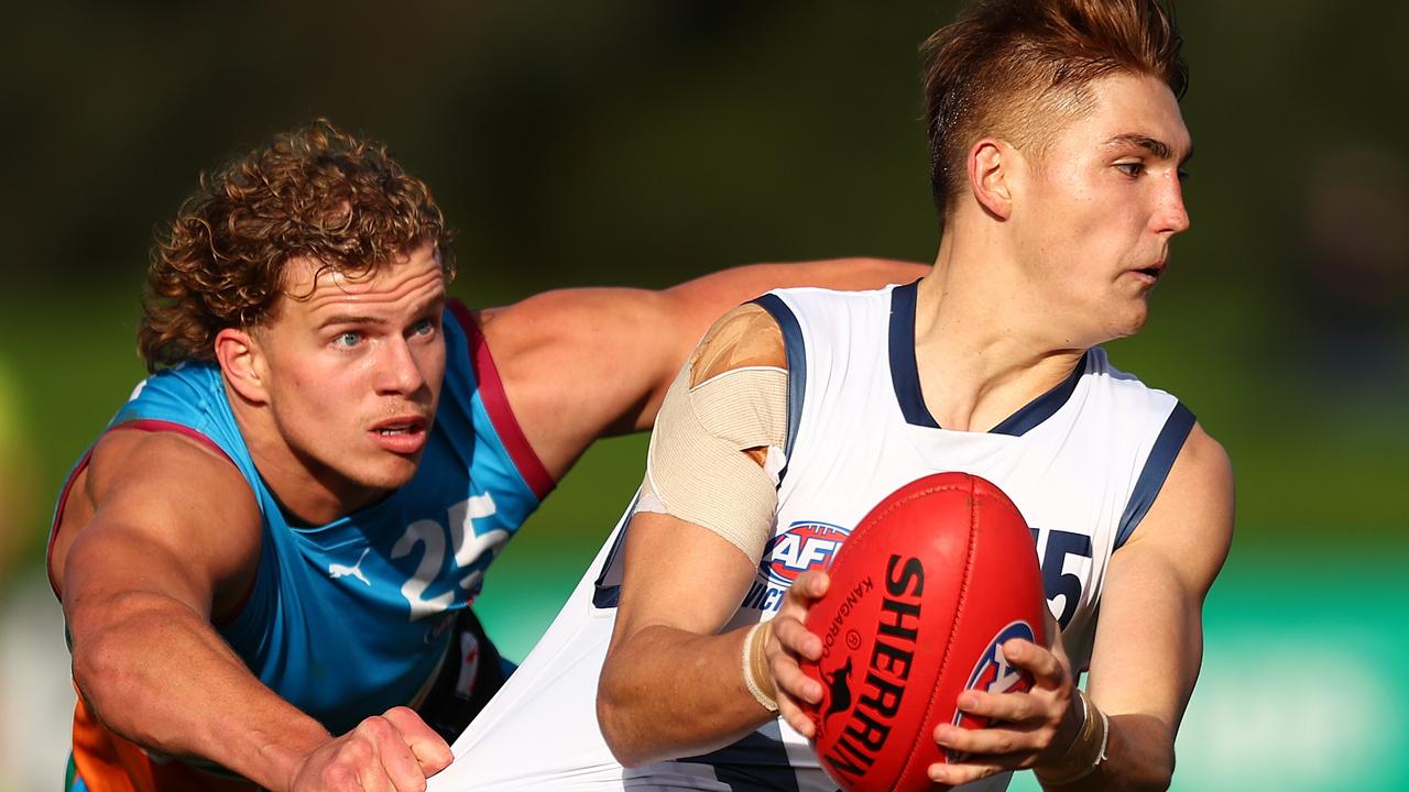 Jed Walter’s defensive pressure helps the key forward further stand out. Picture: Getty Images