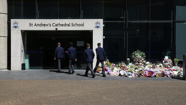 Floral tributes have been left at St Andrew’s Cathedral School for Ms James, as the community and city reels from her murder. Picture: NCA Newswire /Gaye Gerard