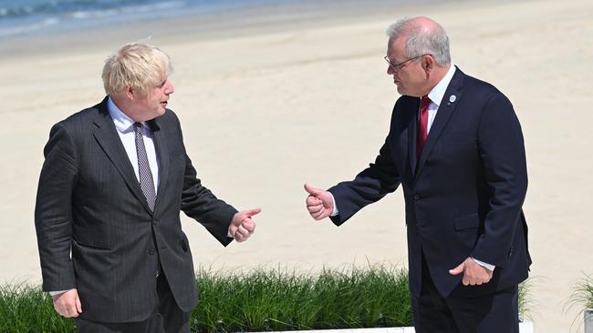 Britain's Prime Minister Boris Johnson greets Australia's Prime Minister Scott Morrison at the G7 summit in Carbis Bay. Picture: Getty Images