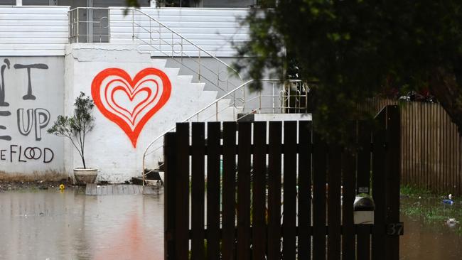 Floodwater surrounds a house in Lismore on March 29, 2022. Picture: Dan Peled/Getty Images