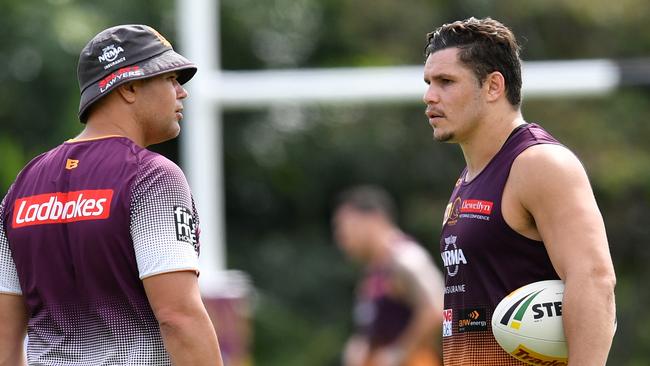 Anthony Seibold chats with James Roberts during a Broncos training session. Picture: AAP