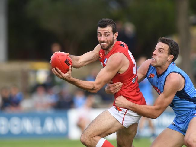 SANFL NORTH V STURT at Prospect Oval. Sturts no 7 Fraser Evans tackles North's no 32 Leigh Ryswyk. Pic: Tricia Watkinson.