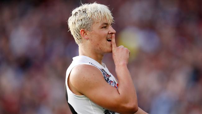 Jack Ginnivan gives the shoosh to a crowd expected to tip over 80,000. Picture: AFL Photos/Getty Images