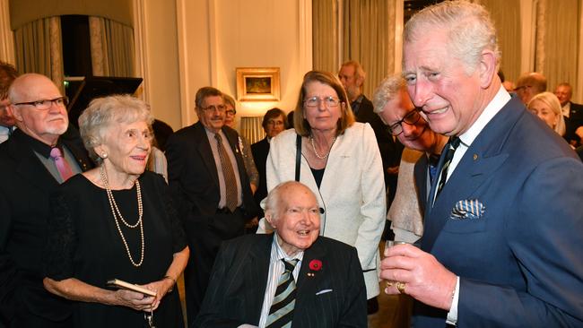 Prince Charles meets with his former french teacher Dr Janet West (L) and his former history teacher Michael Collins Persse (C) from Geelong Grammar at a reception in April, 2018. Picture:Mick Tsikas