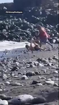 Shocking moment beachgoer is brutally beaten