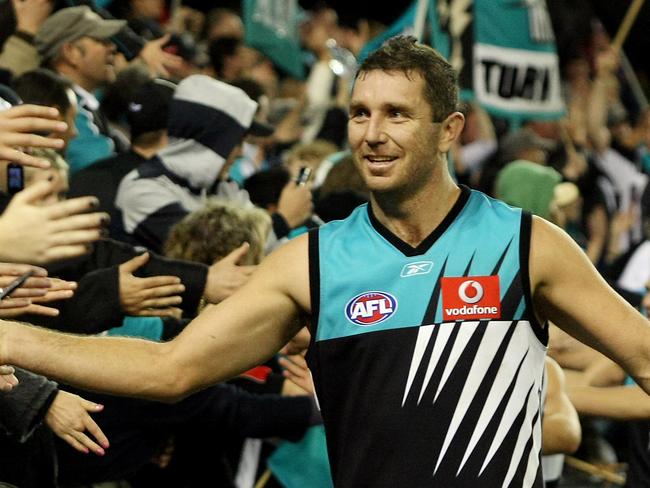 Essendon v Port Adelaide. Telstra Dome. Brendon Lade celebrates the win with the fans