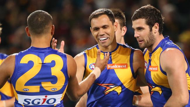 Josh Hill of the Eagles is congratulated by team mates after kicking a goal during the Round 23 AFL match between the Adelaide Crows and the West Coast Eagles at Adelaide Oval  in Adelaide, Friday, Aug. 26, 2016. (AAP Image/Ben Macmahon) NO ARCHIVING, EDITORIAL USE ONLY