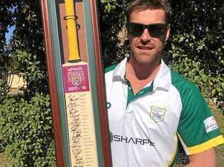 Roma and District Cricket Association president Scott Hilton with the signed Queensland Bulls Sheffield Shield bat that will be auctioned to raise funds. Picture: Contributed