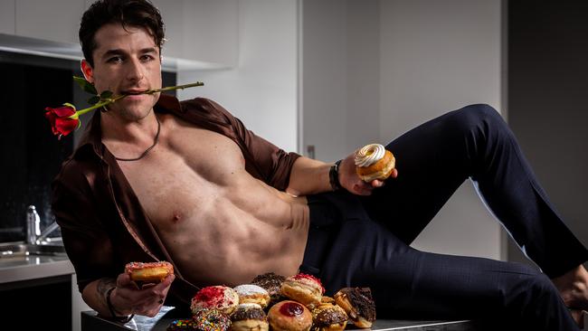 Founder of Levain Doughnuts Anthony Randello Jahn, in his apartment where he films his donut making Instagram videos. @thedonutdaddy has amassed 646k followers on Instagram for his racy cooking videos. Picture: Jake Nowakowski