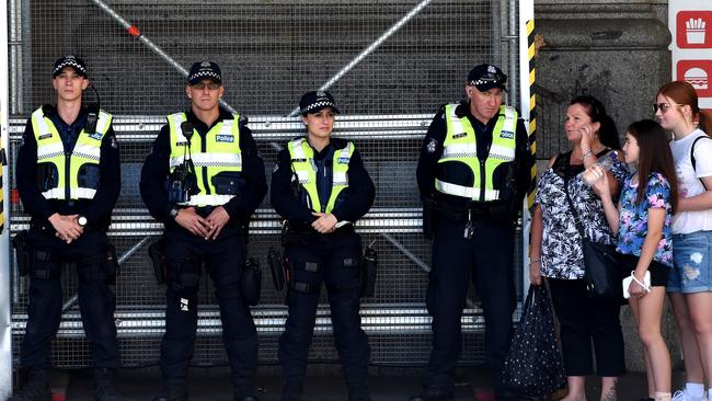 Police presence at the corner of Flinders and Elizabeth streets the day after the horror incident. Picture: Nicole Garmston