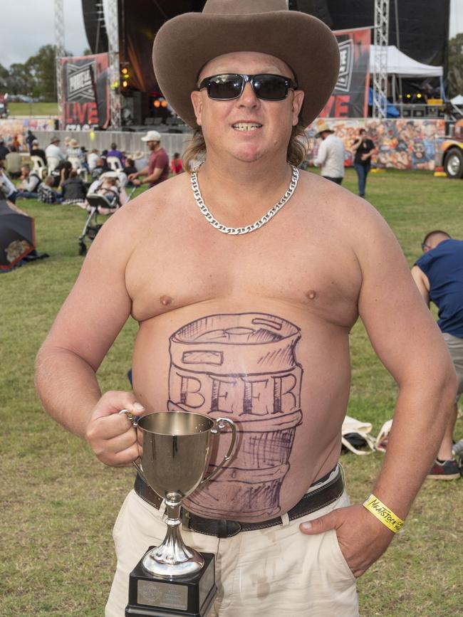 Winner of the Best Dad Bod competition is Matt Jones from Hervey Bay. Meatstock, Toowoomba Showgrounds. Saturday, April 9, 2022. Picture: Nev Madsen.