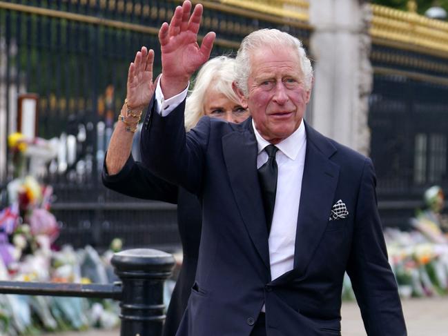 King Charles III and his Queen Consort Camilla greet the crowd at Buckingham Palace a day after Queen Elizabeth II died. Picture: AFP