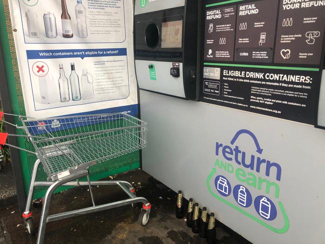 Some people have taken to leaving their bottles for the next person because the Return and Earn reverse vending machines are so often full. Picture: Richard Noone